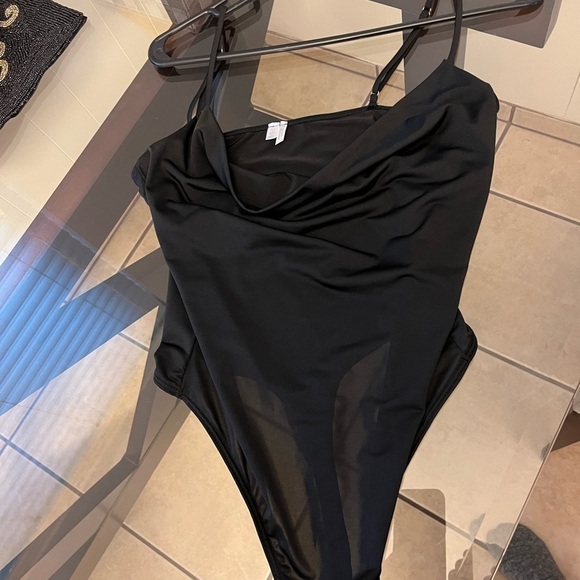 Out From Under Bodysuit: Black Solid
Tops - Size Medium with thong bodysuit. - Picture 6 of 7